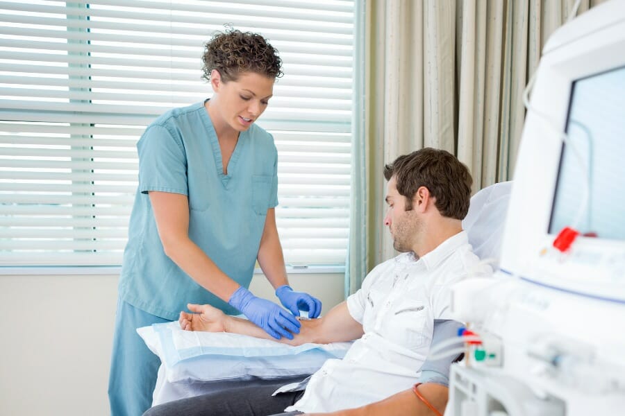 Registered nurse preparing for an injection