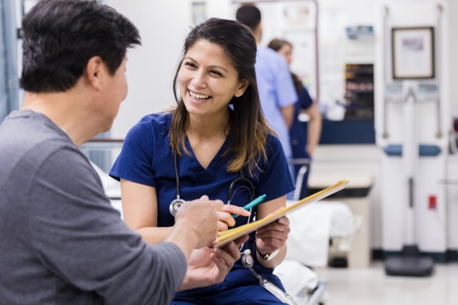 Nurse consulting with her patient