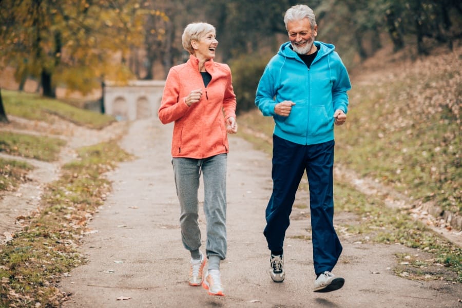 Older couple walking for health