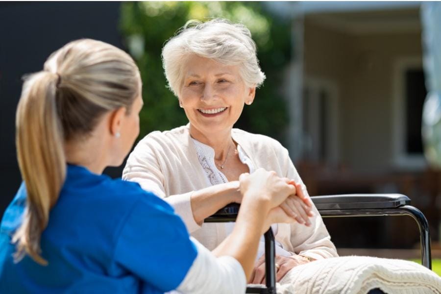 smiling patient and her post op nurse