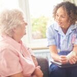 Smiling patient and her post op private nurse