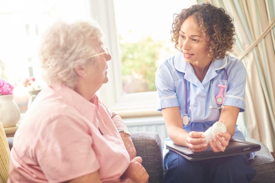 Smiling patient and her post op private nurse