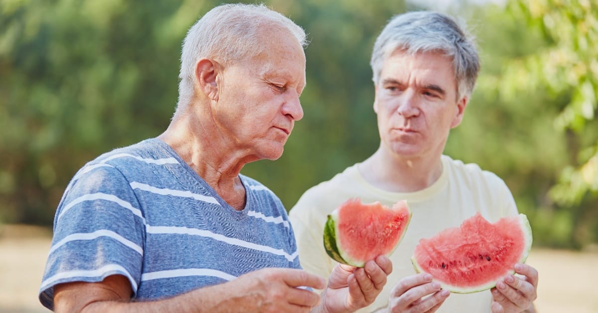 A man with Parkinson's Disease having difficulty swallowing