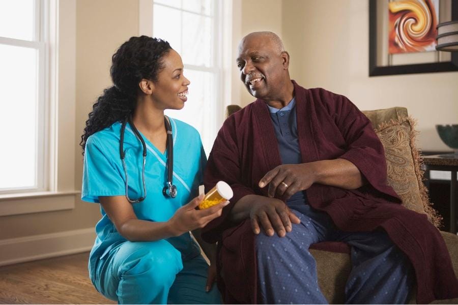 A man receiving medication management after his surgery