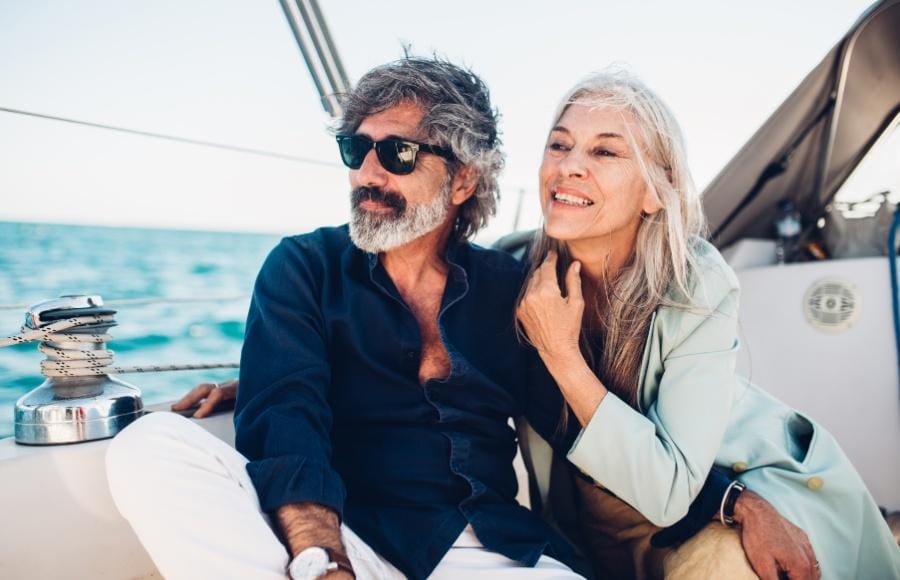 Middle aged, distinguished couple on a boat in South Beach