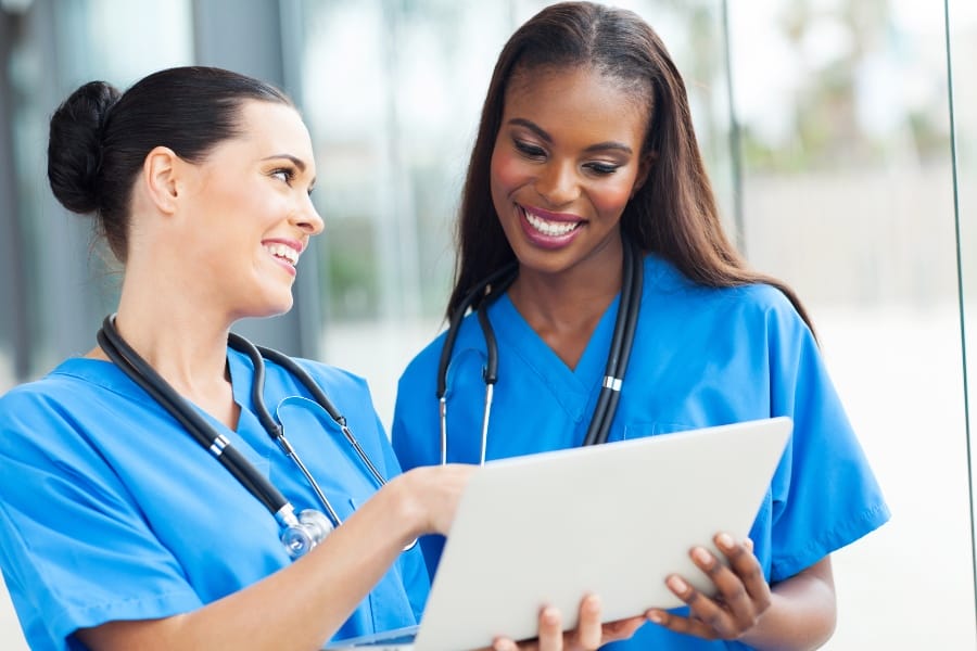 nurses smiling and laughing