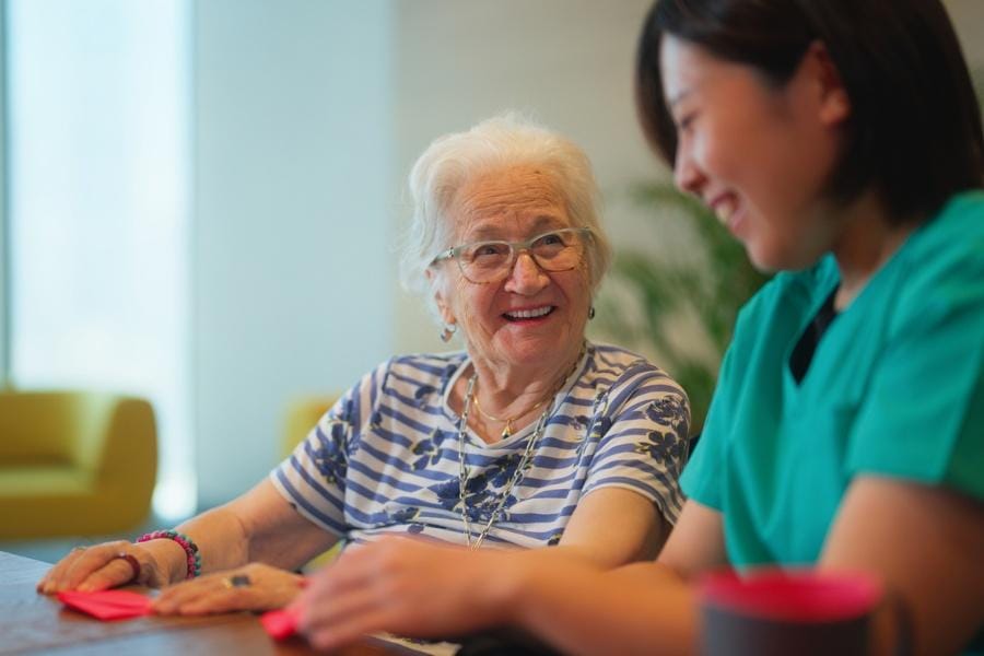 Elderly woman with Parkinson's Disease