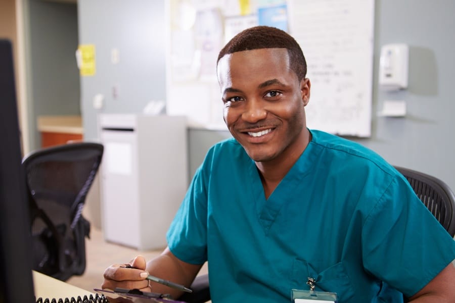 A smiling nurse at a medical facility