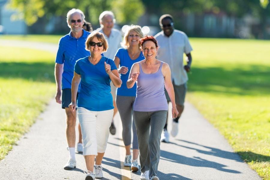 Elderly friends on a day walk together