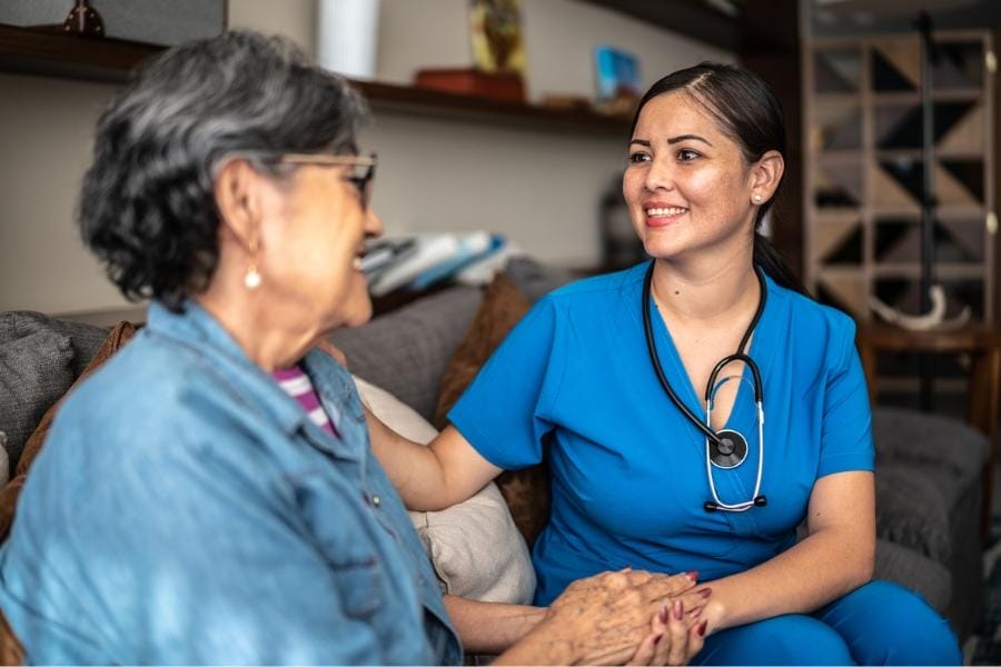 home nurse smiling with her client