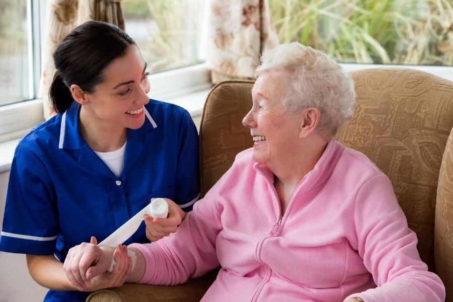 elderly patient receiving wound care at home