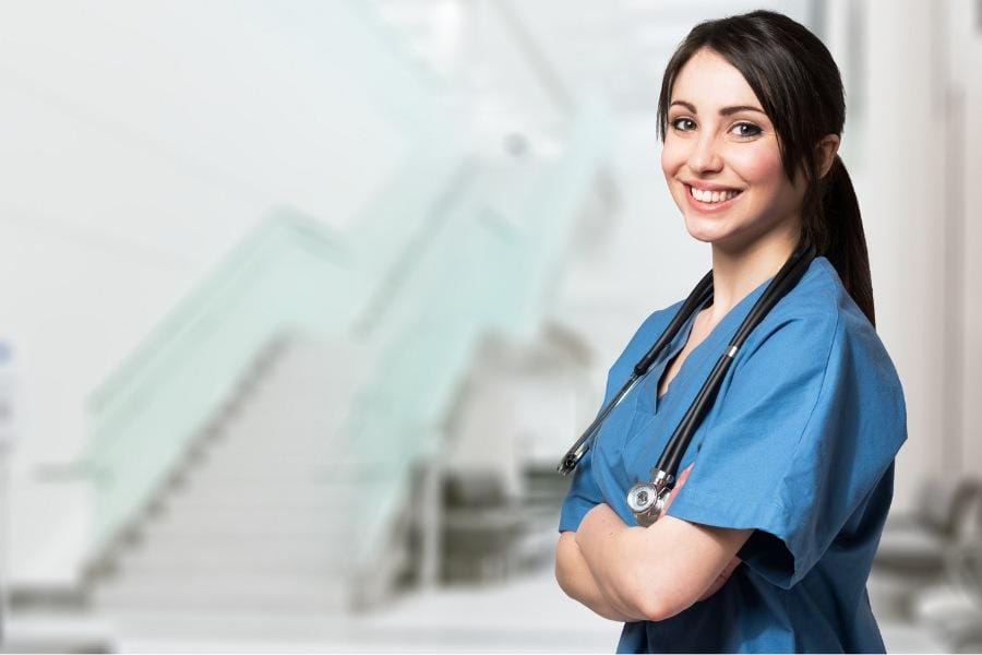 A smiling nurse in a healthcare facility