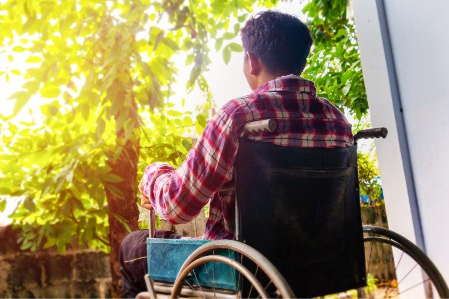 A man in a wheelchair with multiple sclerosis